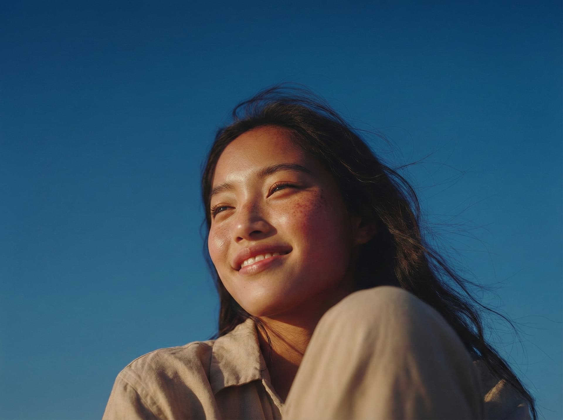 Woman smiling in sunlight